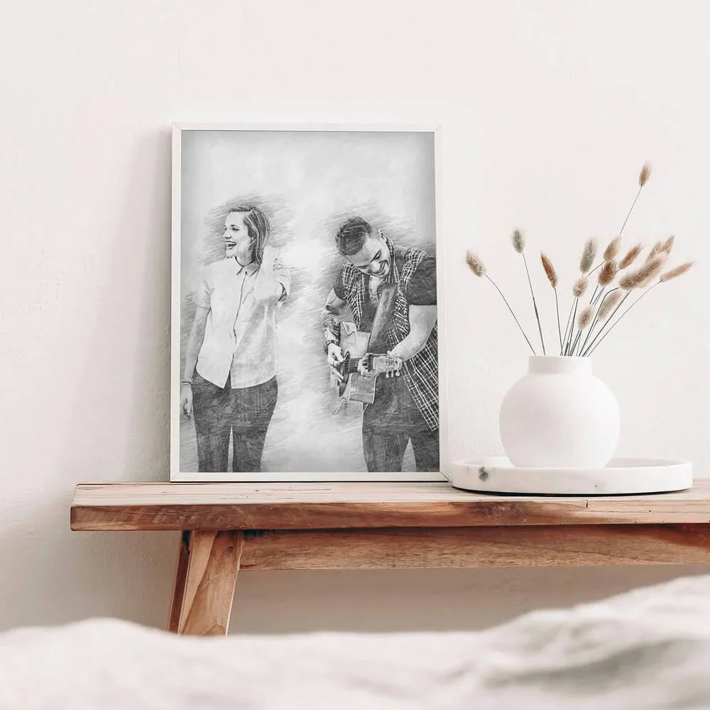 Personalised pencil portrait of couple with guitar, framed in white, engagement and music lover gift designed in the UK